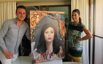 Luigi Basile consegna l’opera dedicata a Elisabetta Gregoraci